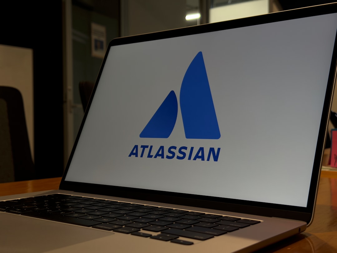 Laptop displaying the atlassian logo